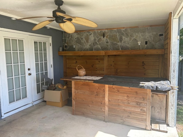 exterior space featuring ceiling fan and french doors