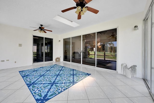 view of swimming pool with a ceiling fan and a patio area