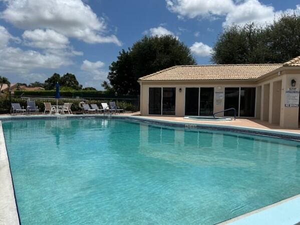 6090 Evian Pl, Boynton Beach, FL 33437 - pool with fence and a patio area