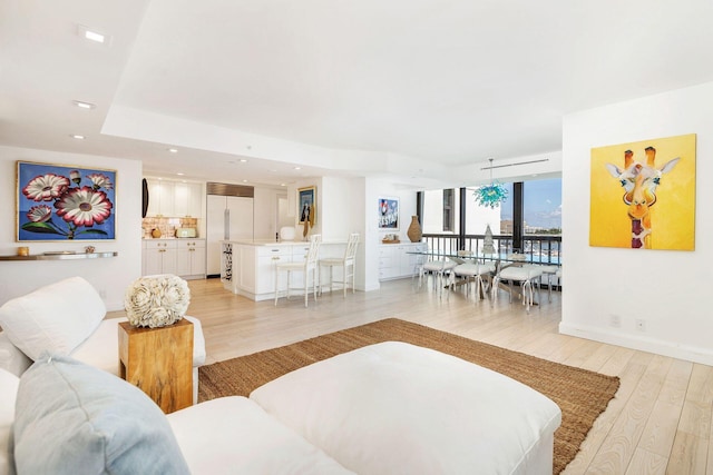 living room with light hardwood / wood-style floors