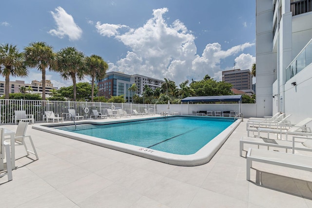 view of swimming pool with a patio