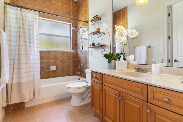 full bathroom featuring shower / bath combo, oversized vanity, toilet, and tile flooring