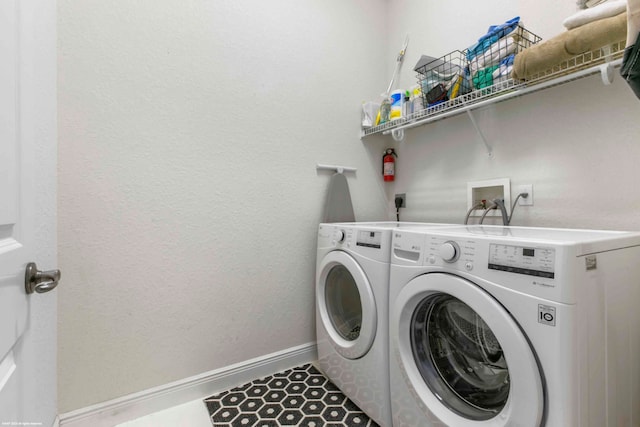 laundry room featuring washer hookup, separate washer and dryer, electric dryer hookup, and tile floors