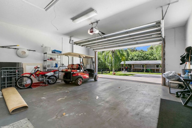 garage featuring a garage door opener