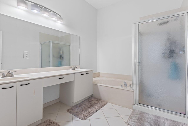 bathroom featuring vanity, shower with separate bathtub, and tile patterned flooring