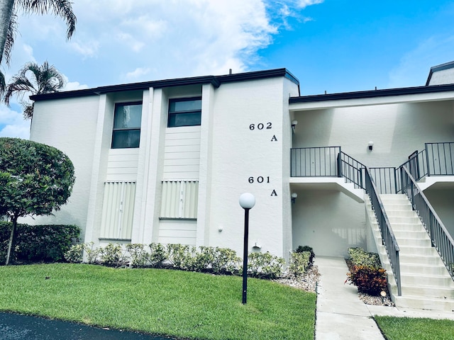 view of property with a front yard