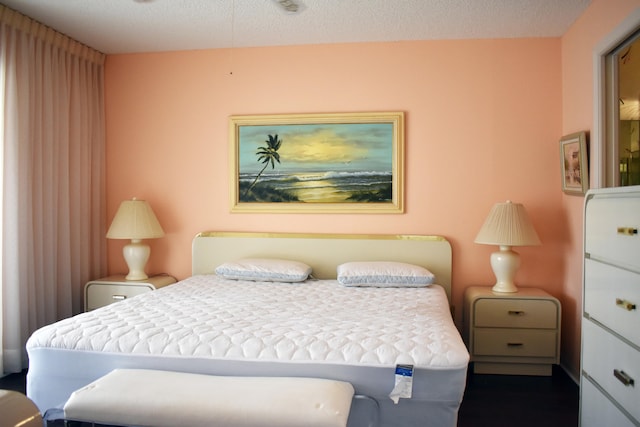 bedroom featuring a textured ceiling