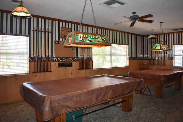 playroom with billiards, ceiling fan, a textured ceiling, and a wealth of natural light