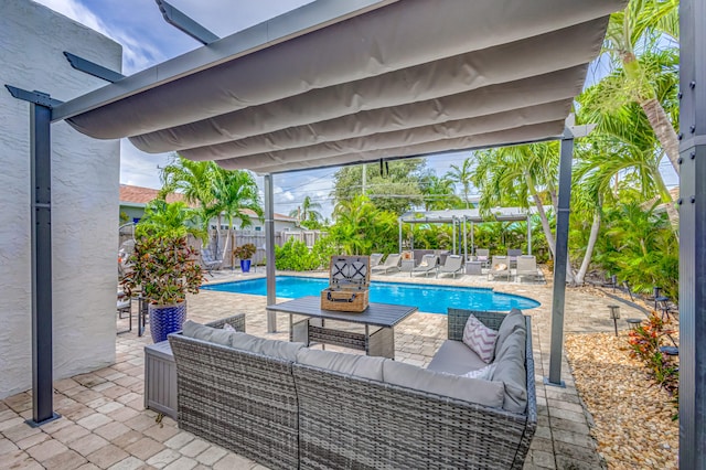 view of pool with a patio area and outdoor lounge area