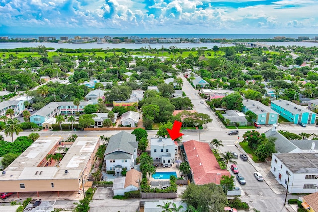 birds eye view of property featuring a water view