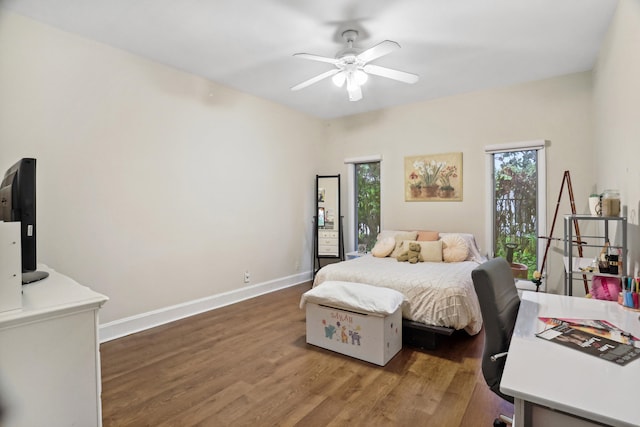 bedroom featuring ceiling fan and dark hardwood / wood-style flooring