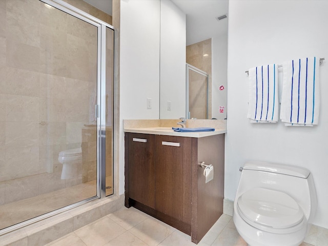 bathroom featuring an enclosed shower, toilet, large vanity, and tile flooring