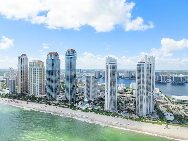 property's view of city featuring a beach view and a water view