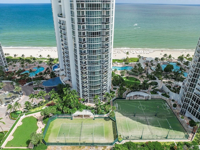 bird's eye view with a beach view and a water view