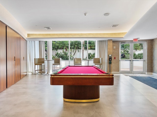 recreation room featuring light tile floors, pool table, and french doors