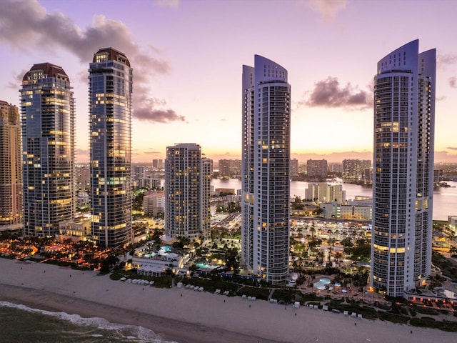 view of city featuring a view of the beach and a water view