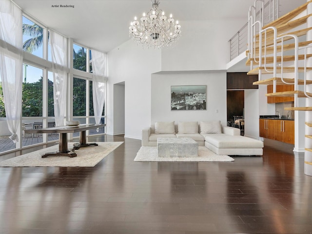 living room featuring an inviting chandelier, dark hardwood / wood-style flooring, sink, and a high ceiling