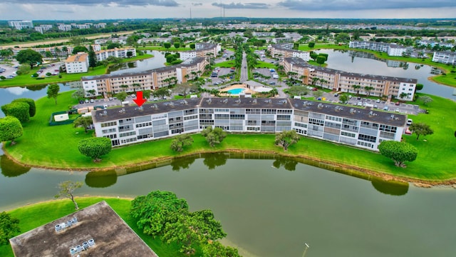 drone / aerial view with a water view