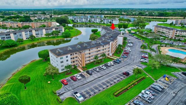 drone / aerial view with a water view