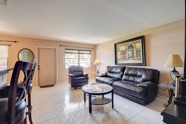 living room with light tile floors