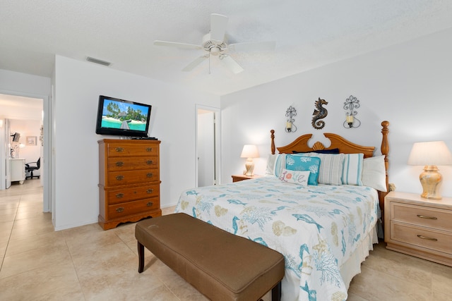 bedroom with light tile flooring and ceiling fan