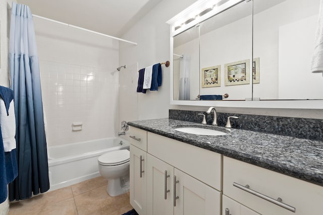 full bathroom featuring tile flooring, large vanity, toilet, and shower / bathtub combination with curtain