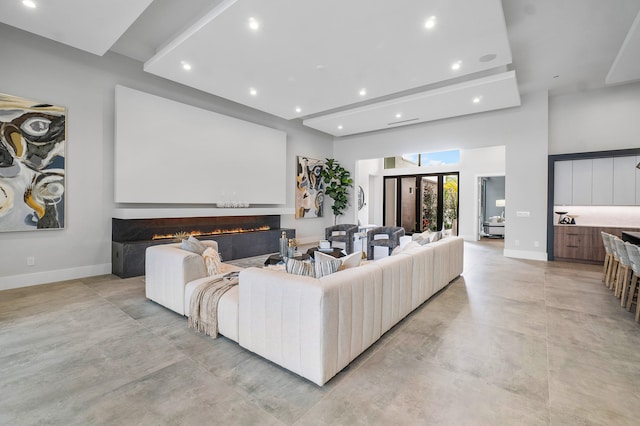 living room featuring light tile floors