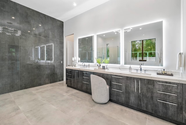 bathroom with tile flooring and dual bowl vanity