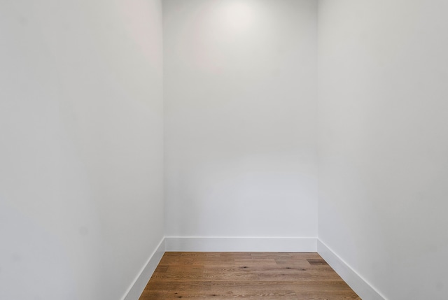 unfurnished room with light wood-type flooring