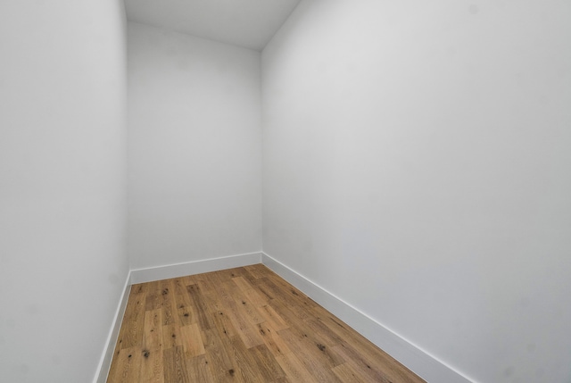 spare room featuring light hardwood / wood-style flooring