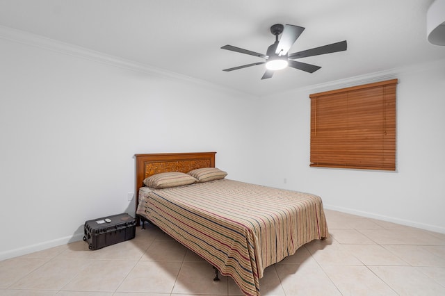 tiled bedroom featuring ceiling fan and ornamental molding