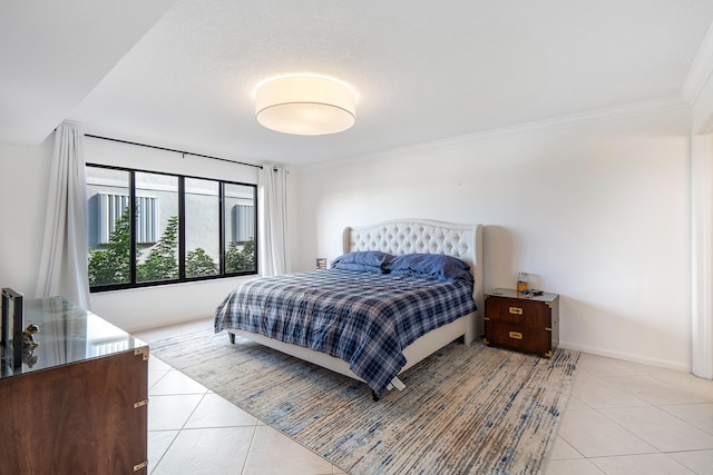 bedroom featuring light tile floors and crown molding