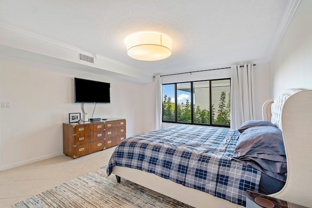 tiled bedroom featuring crown molding