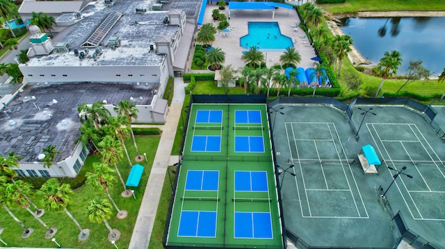 birds eye view of property with a water view