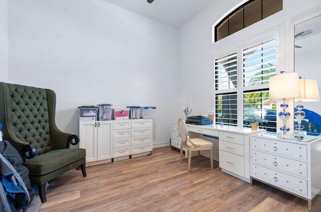 home office featuring hardwood / wood-style floors