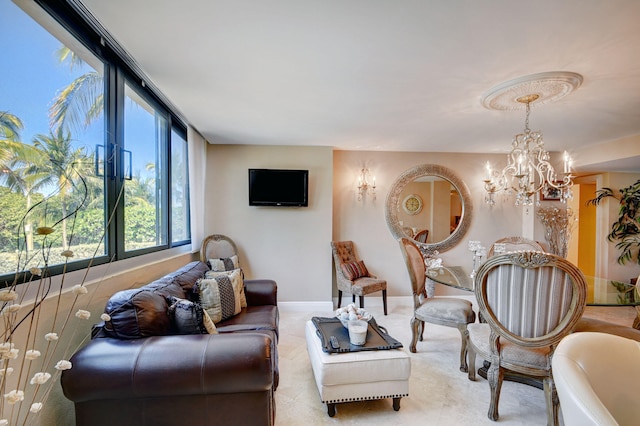 living room featuring a notable chandelier and baseboards