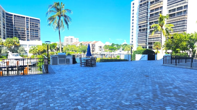 view of yard featuring exterior kitchen