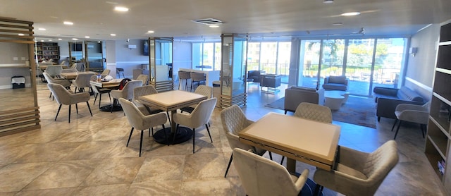 dining room with a wall of windows