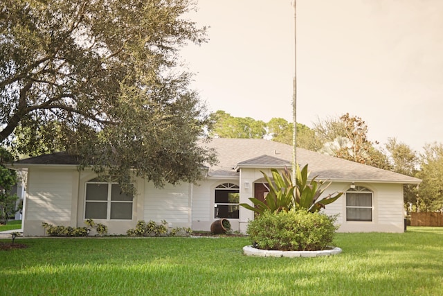 view of front of home with a front yard