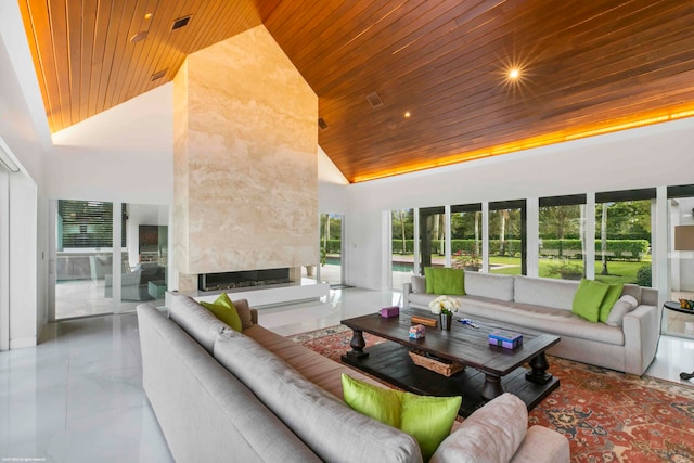 tiled living room with wooden ceiling and a towering ceiling