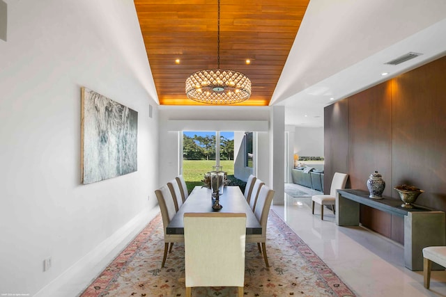 dining area featuring wooden ceiling, vaulted ceiling, and tile patterned flooring