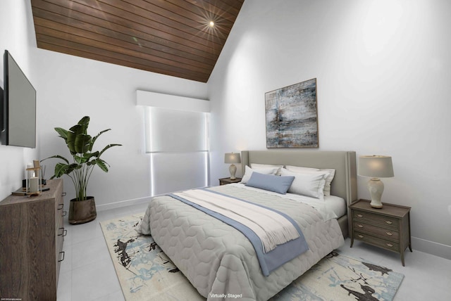 empty room featuring tile patterned flooring, lofted ceiling, and wood ceiling