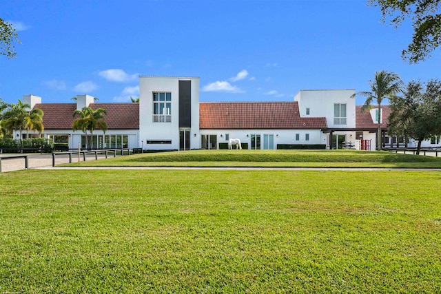 view of community featuring a lawn