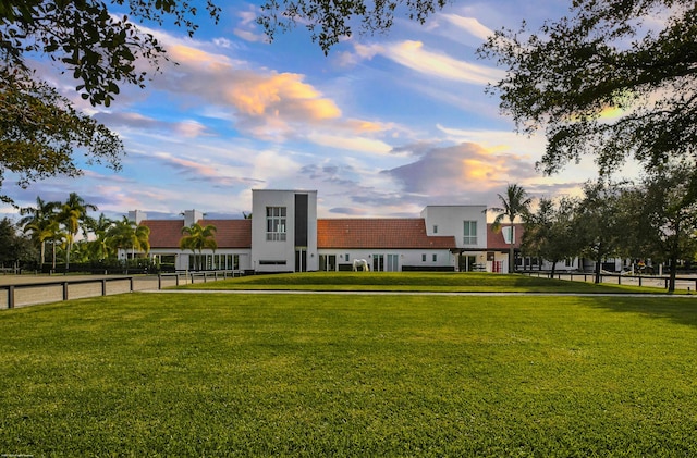 surrounding community with a lawn