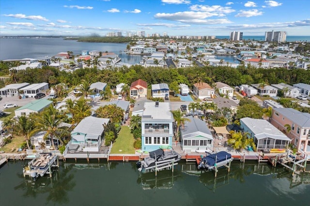 drone / aerial view with a water view