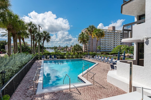 view of pool featuring a patio area