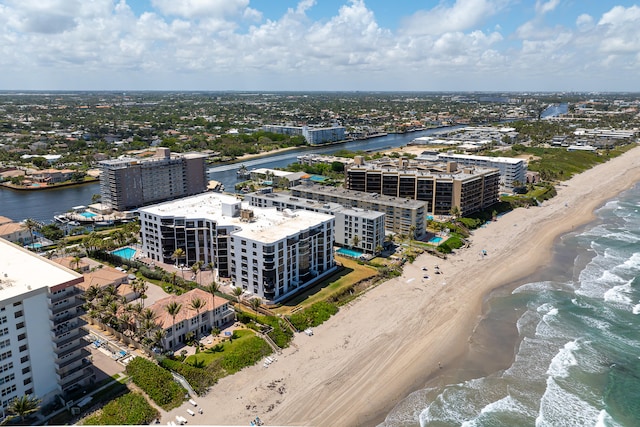 aerial view featuring a water view and a view of the beach