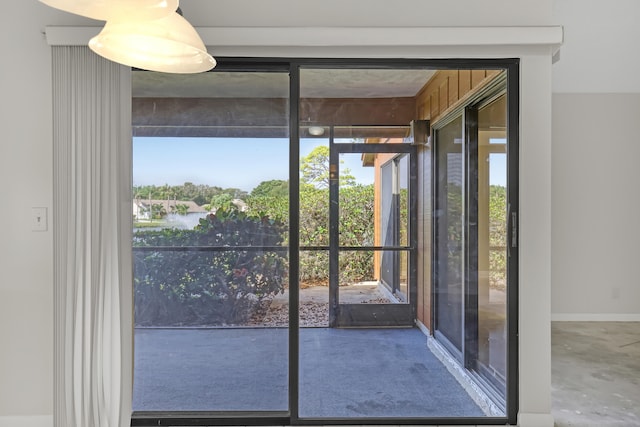 doorway with concrete floors