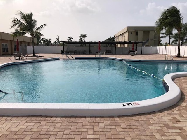 view of pool featuring a patio area