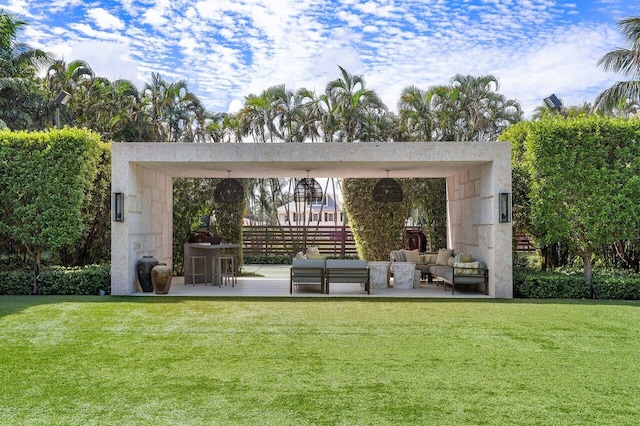 exterior space with outdoor lounge area and a pergola